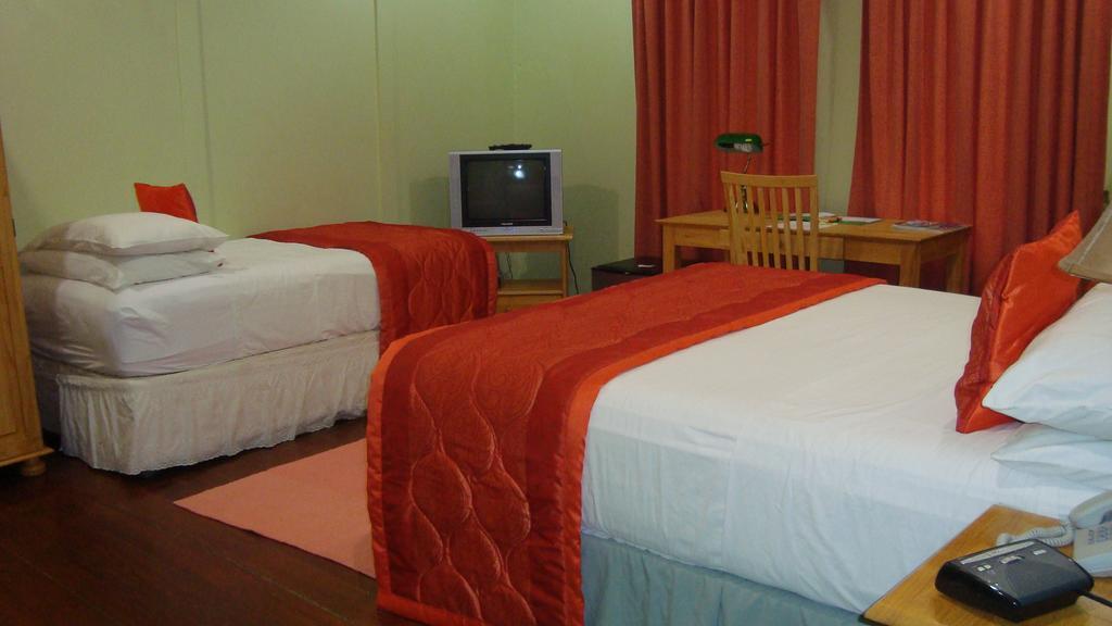 Heritage Inn Trinidad Belmont Habitación foto